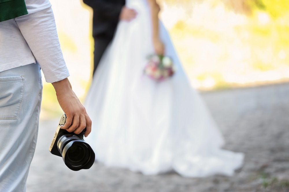 Hochzeitsfotograf und Brautpaar